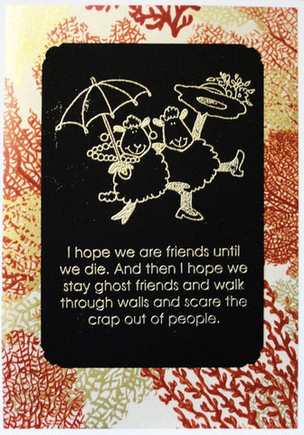 handmade card with 2 embossed gold sheep embossed gold words on red & gold paper background