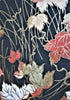 Close-up of Japanese chiyogami paper autumn leaves on black with gold accents Close-up of Japanese chiyogami paper autumn leaves on black with gold accents