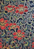 Close-up of Japanese chiyogami paper red flowers on green/dark blue background with gold accents Close-up of Japanese chiyogami paper red flowers on green/dark blue background with gold accents