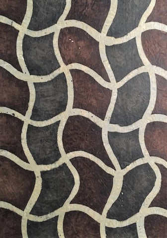 Oiled lokta paper from Nepal, translucent wax design on brown & grey background