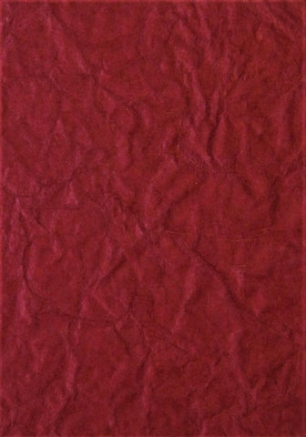 Cotton rag paper from India, leather-like appearance red