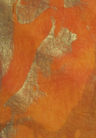 Marbled mulberry paper from Thailand, gold metallics on orange red background