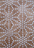 Close-up of Japanese chiyogami paper white dots on shades of brown in geometric pattern