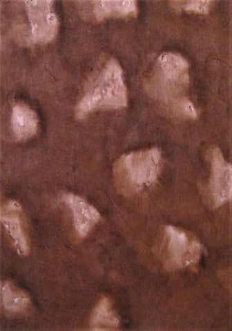 Lokta paper from Nepal, pattern of large white irregular blotches on brown