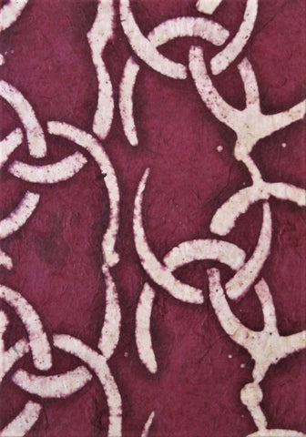 Oiled lokta paper from Nepal, translucent wax design on burgandy red background
